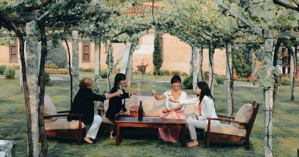 Drinking albariño wine under the slate terraces in Rias Baixas