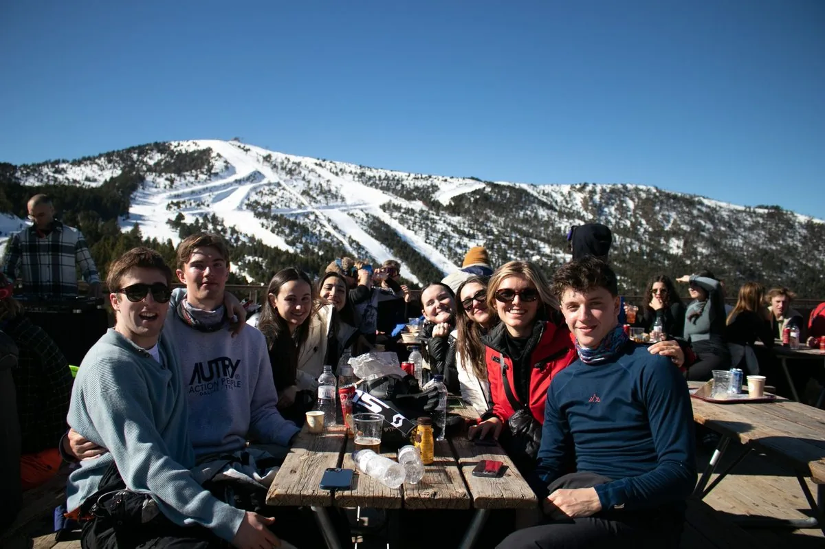 The group at lunch with the Pyrenees behind